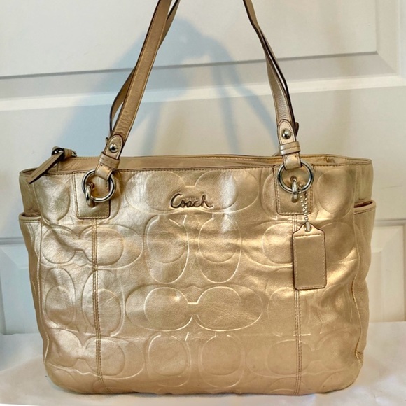 Coach Handbags - COACH Gold Embossed Leather Signature Gallery East West Tote Shoulder Bag